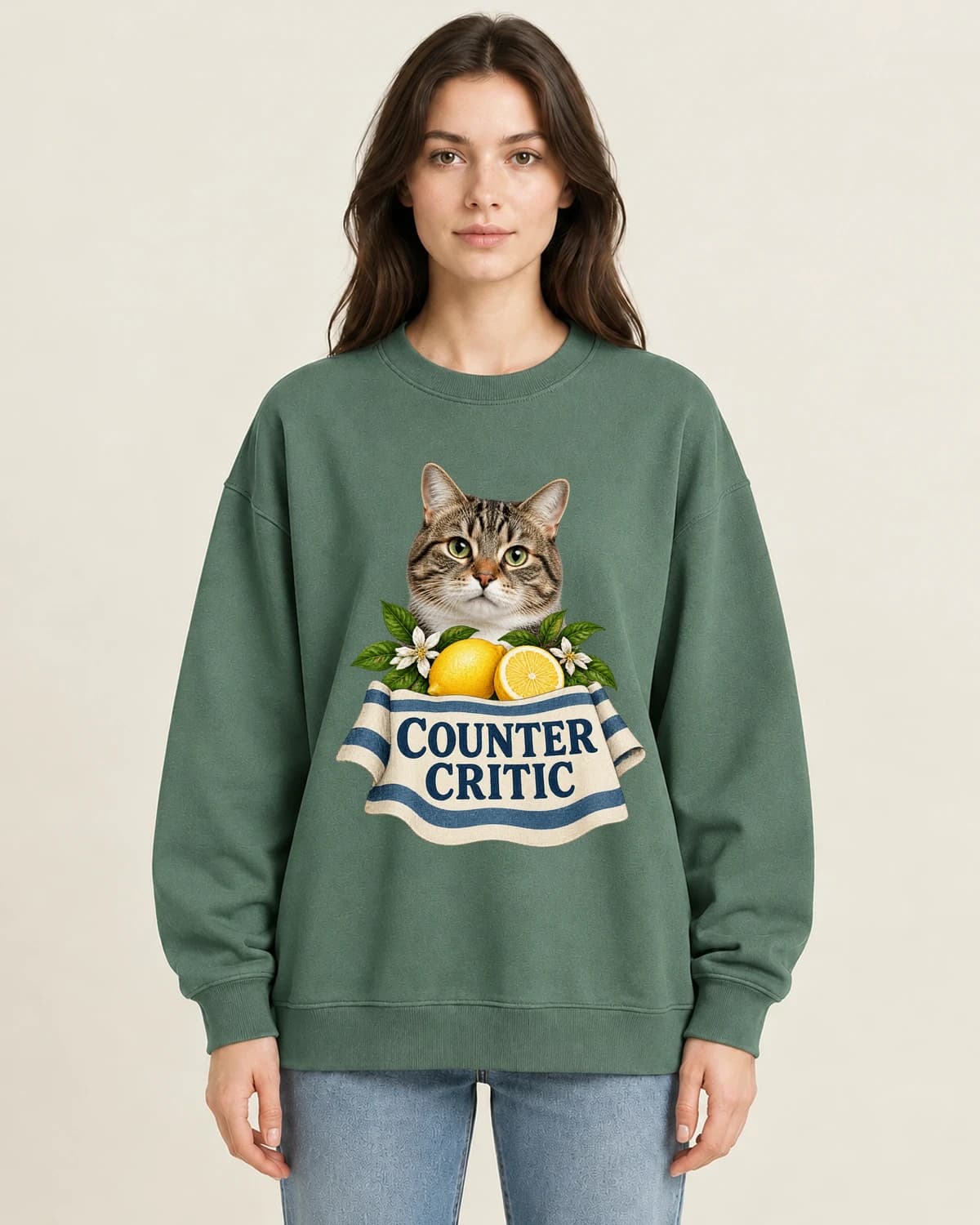 Kitchen Counter Critic on women's 220gsm Army Green crewneck; illustrative styling